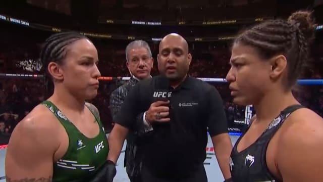 Raquel Pennington and Mayra Bueno Silva go face-to-face before the first round of their UFC 297 title fight.